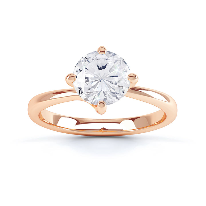 Twisted 4 Claw Diamond Solitaire Ring